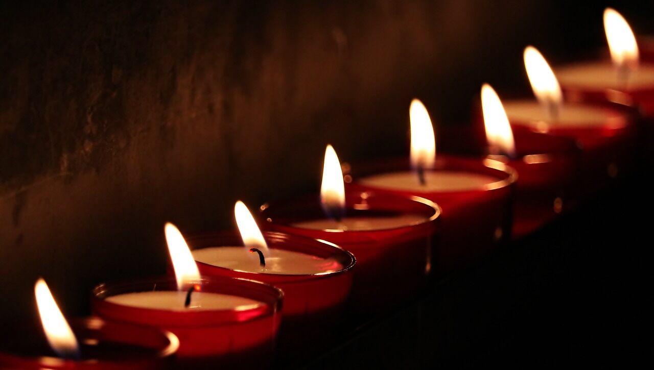 lit candles during mourning of a family member who died through wrongful death