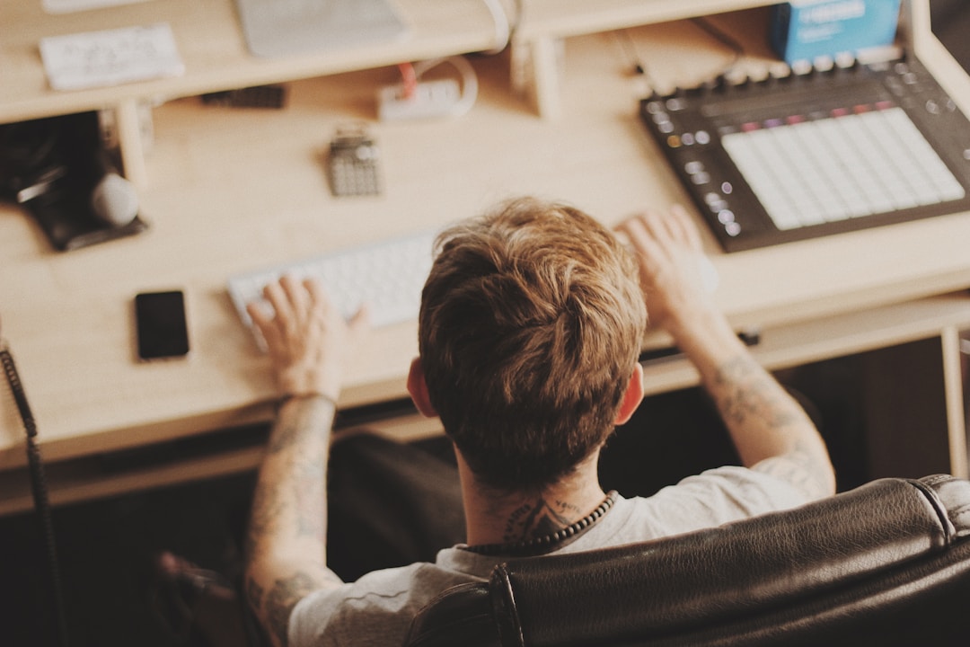 A male professional working with an enterprise AI tool, focusing on enhanced efficiency and automation in a business setting
