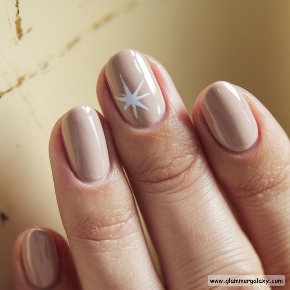 Neutral Winter Nails having Starry Celestial Designs
