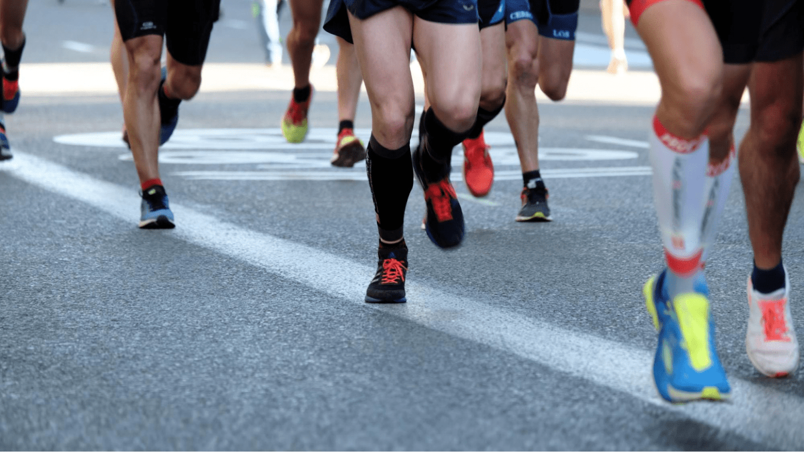 Runners start a road race