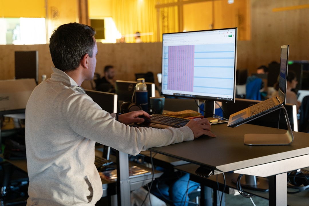 A professional man analyzing data and making decisions with the assistance of AI technology, highlighting its role in transforming data-driven strategies