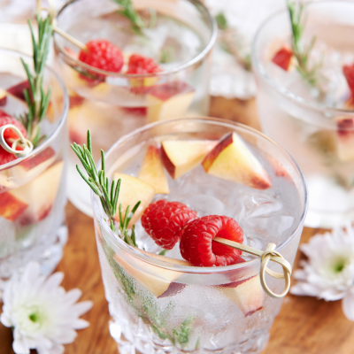 Non alcoholic mocktails with Rosemary Apples and Raspberries