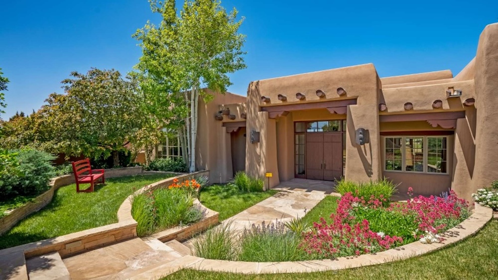 santa fe adobe home in the spring