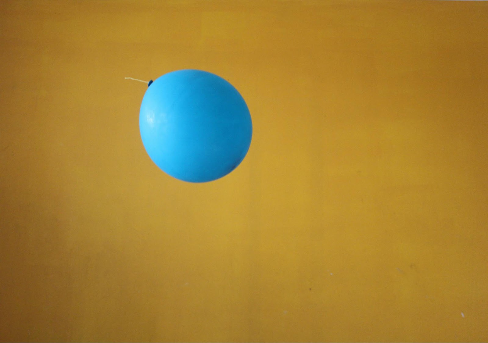 Balloon tying tool in action