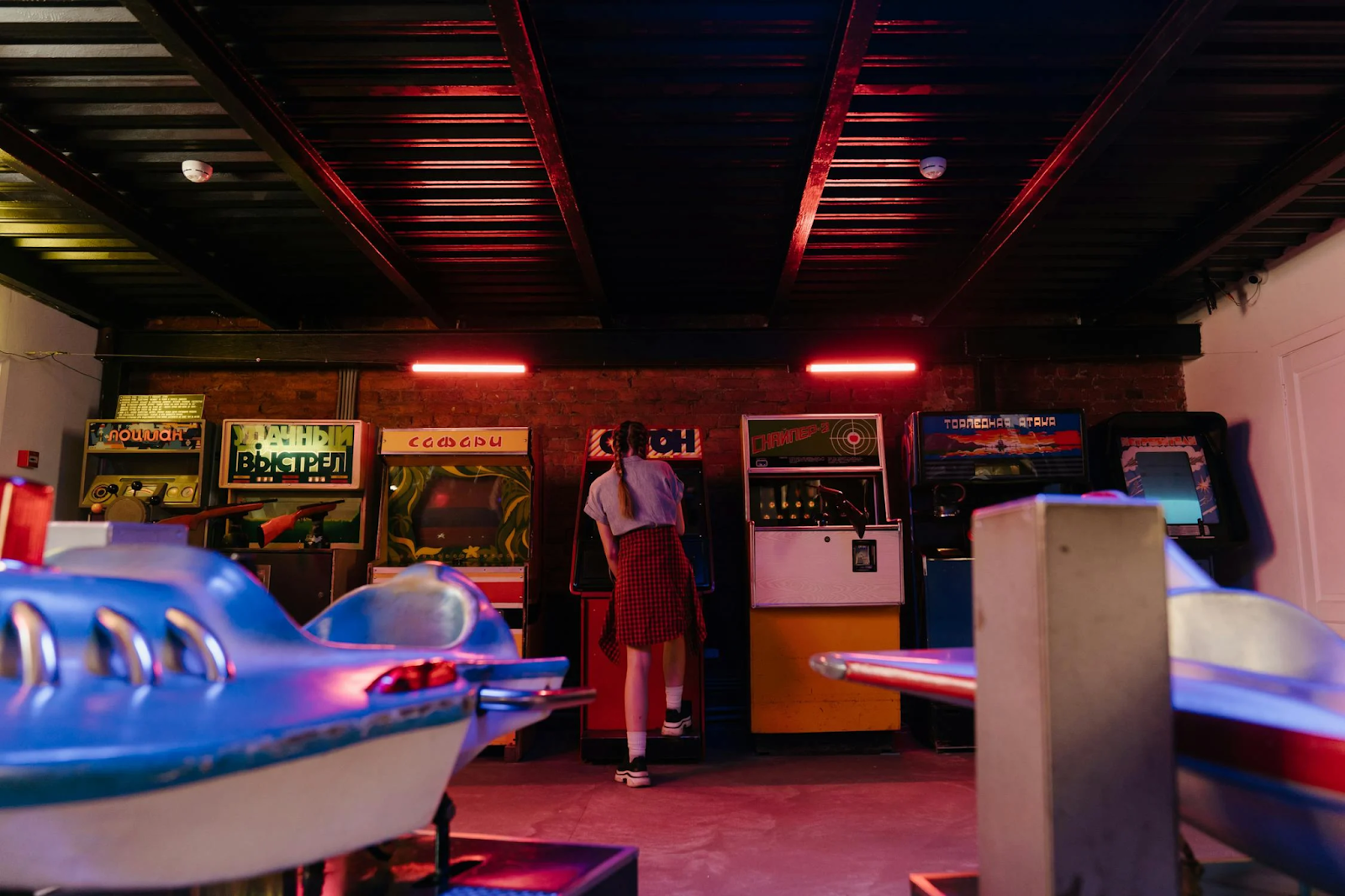 A Lady in an Arcade Room