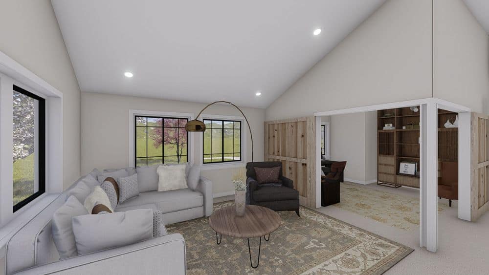 The sitting room lies next to the home office enclosed in wooden sliding doors.