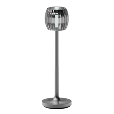 A silver lamp with a round base

Description automatically generated