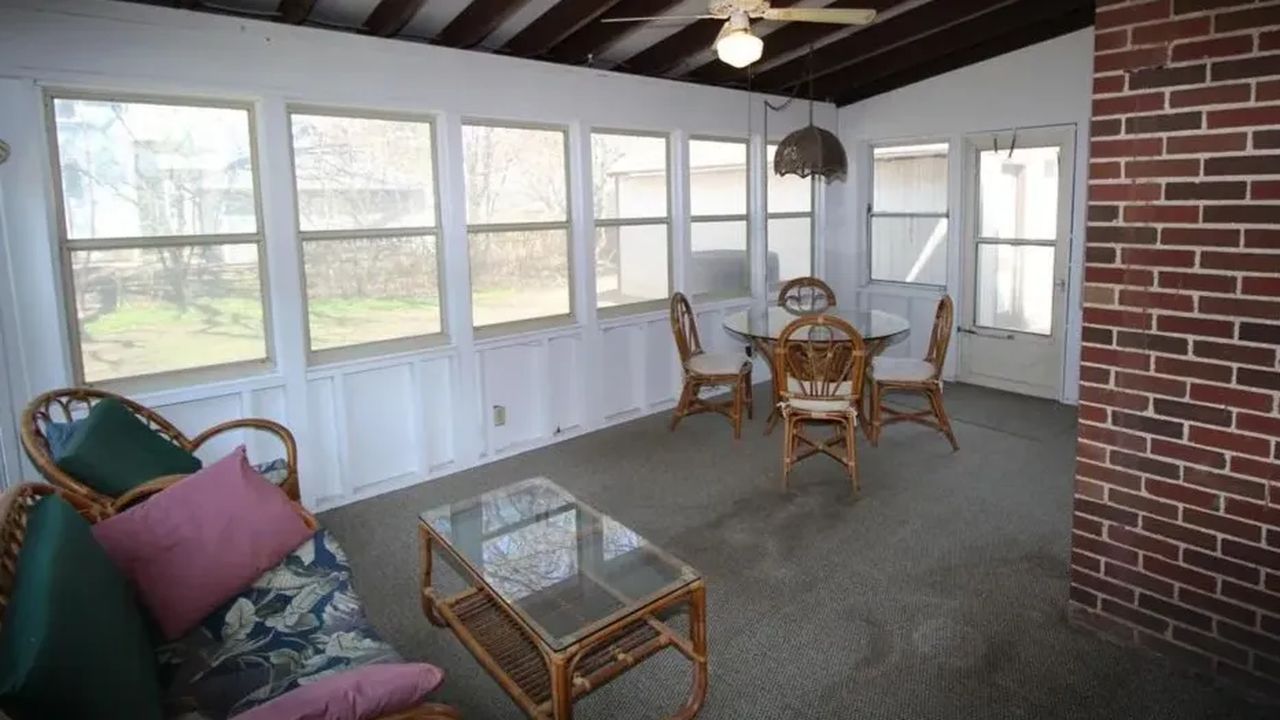 Charming 3-Bedroom Brick Home with Cozy Fireplaces and 3-Season Porch (Floor Plan Inside)