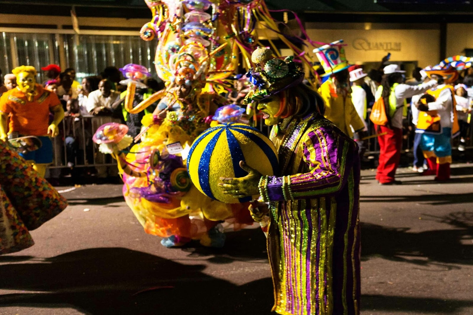 People in colorful costumes at a celebration.