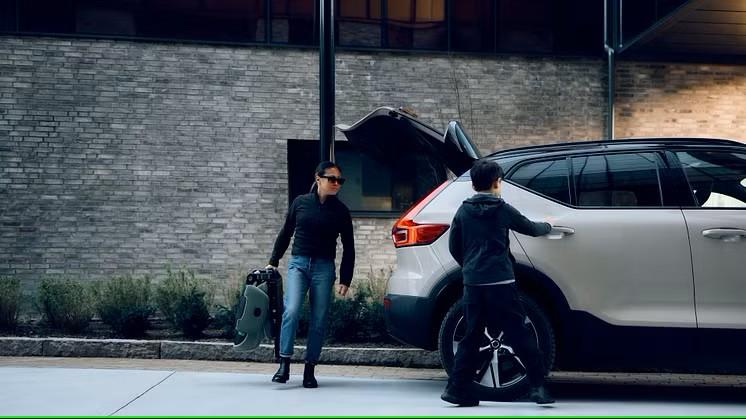 A person walking towards a car AI-generated content may be incorrect.