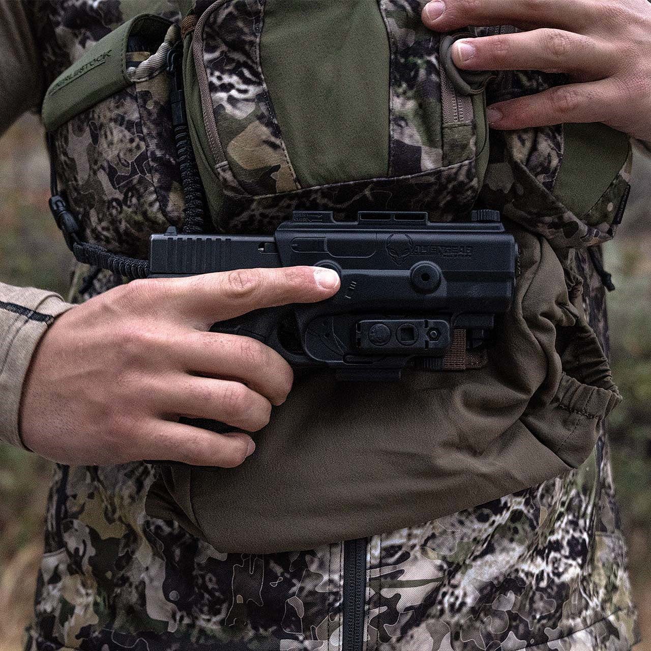 pistol holster attached to the Eberlestock Recon MOLLE Panel