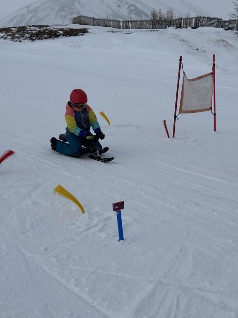 A person on skis in the snow
AI-generated content may be incorrect.
