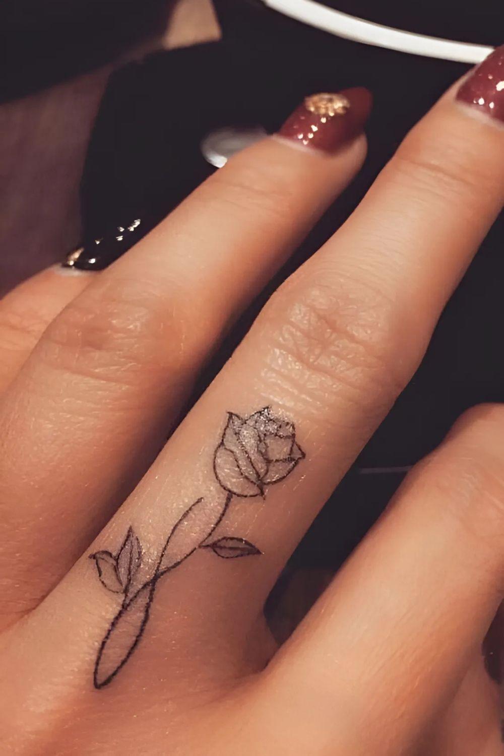 Rose Finger Tattoo