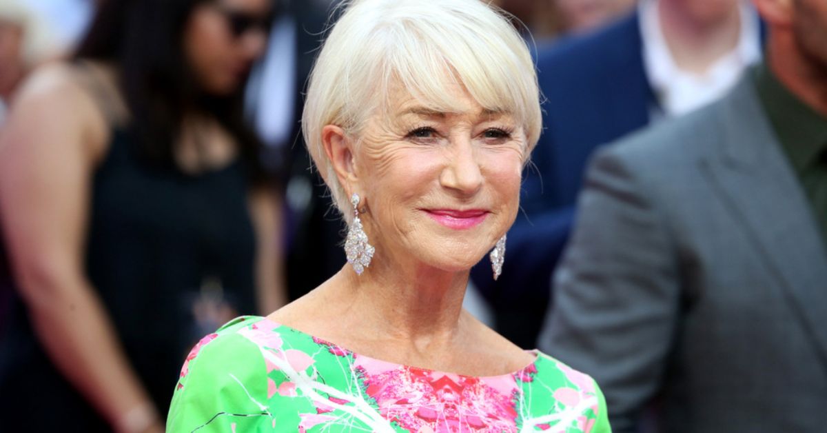 Helen Mirren, with feathered bangs, expresses her views on feminism, stating she does not identify as a feminist.