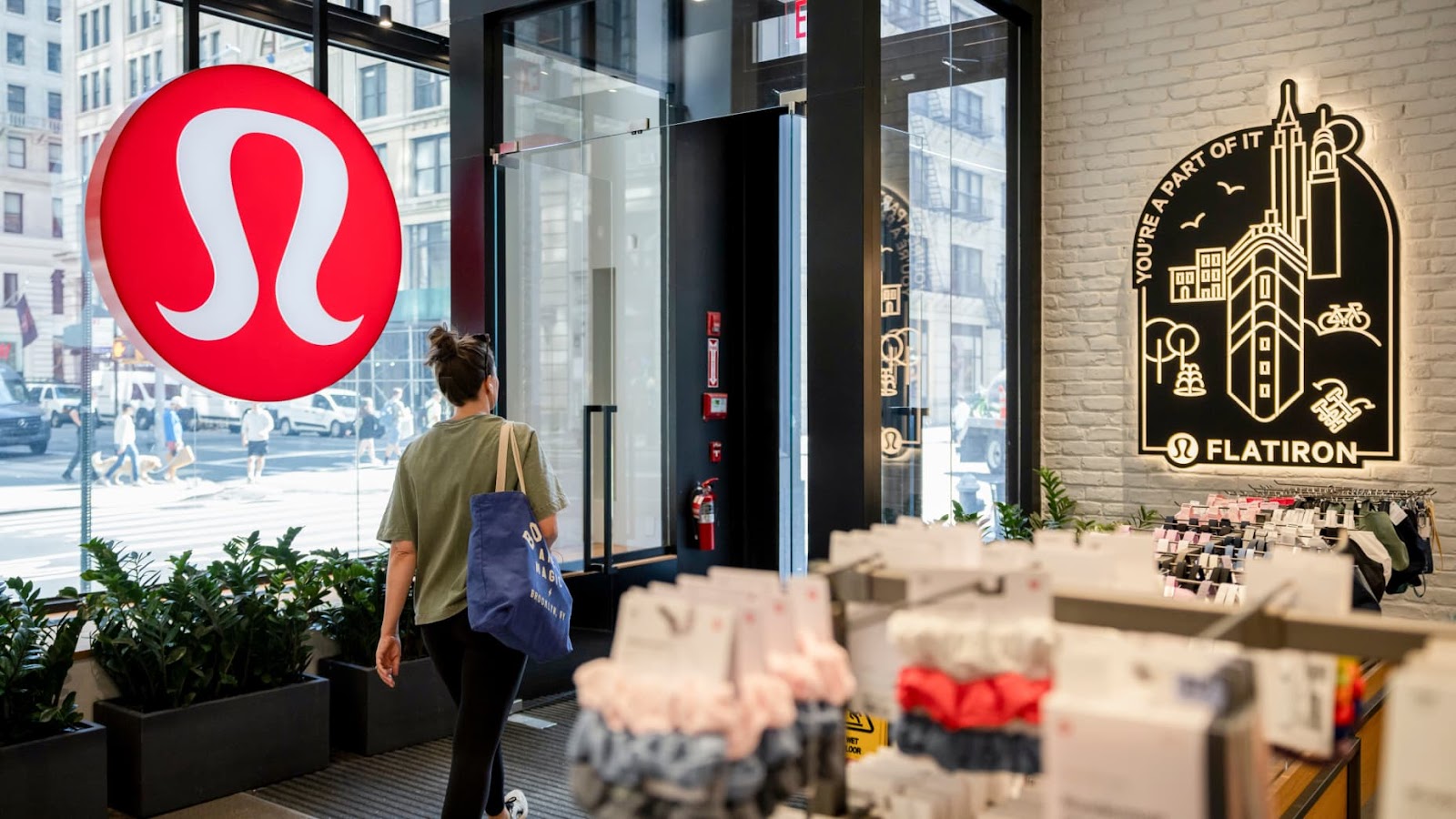A customer exits a Lululemon store in New York, US, on Thursday, Aug. 22, 2024. Lululemon Athletica Inc. is scheduled to release earnings figures on August 29. Photographer: Yuki Iwamura/Bloomberg via Getty Images