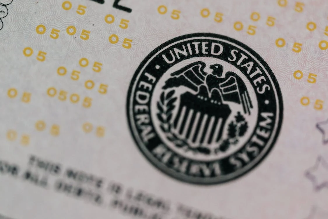 Federal Reserve logo on a US bill representing the impact of interest rate cuts on Bitcoin bull run 2024