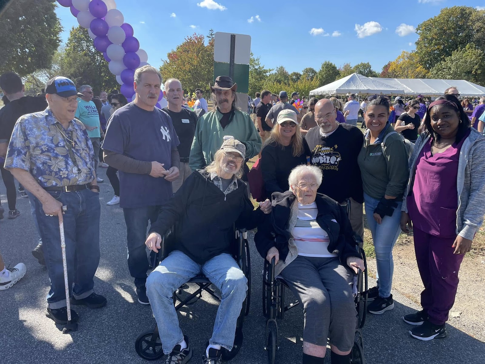 A picture of a group of seniors on an outing outside