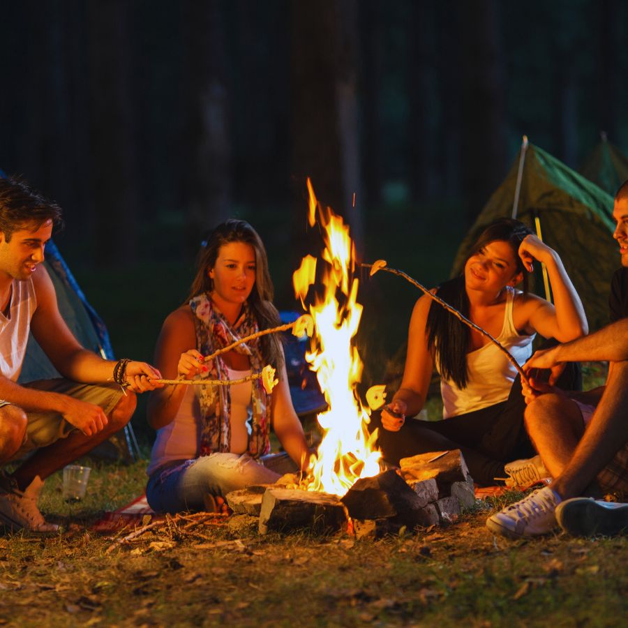 family around campfire