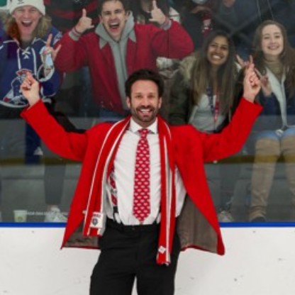 Grant Harvey celebrates on the ice during his years coaching UNM Lobo Hockey, a role that deepened his connection to the Albuquerque community.