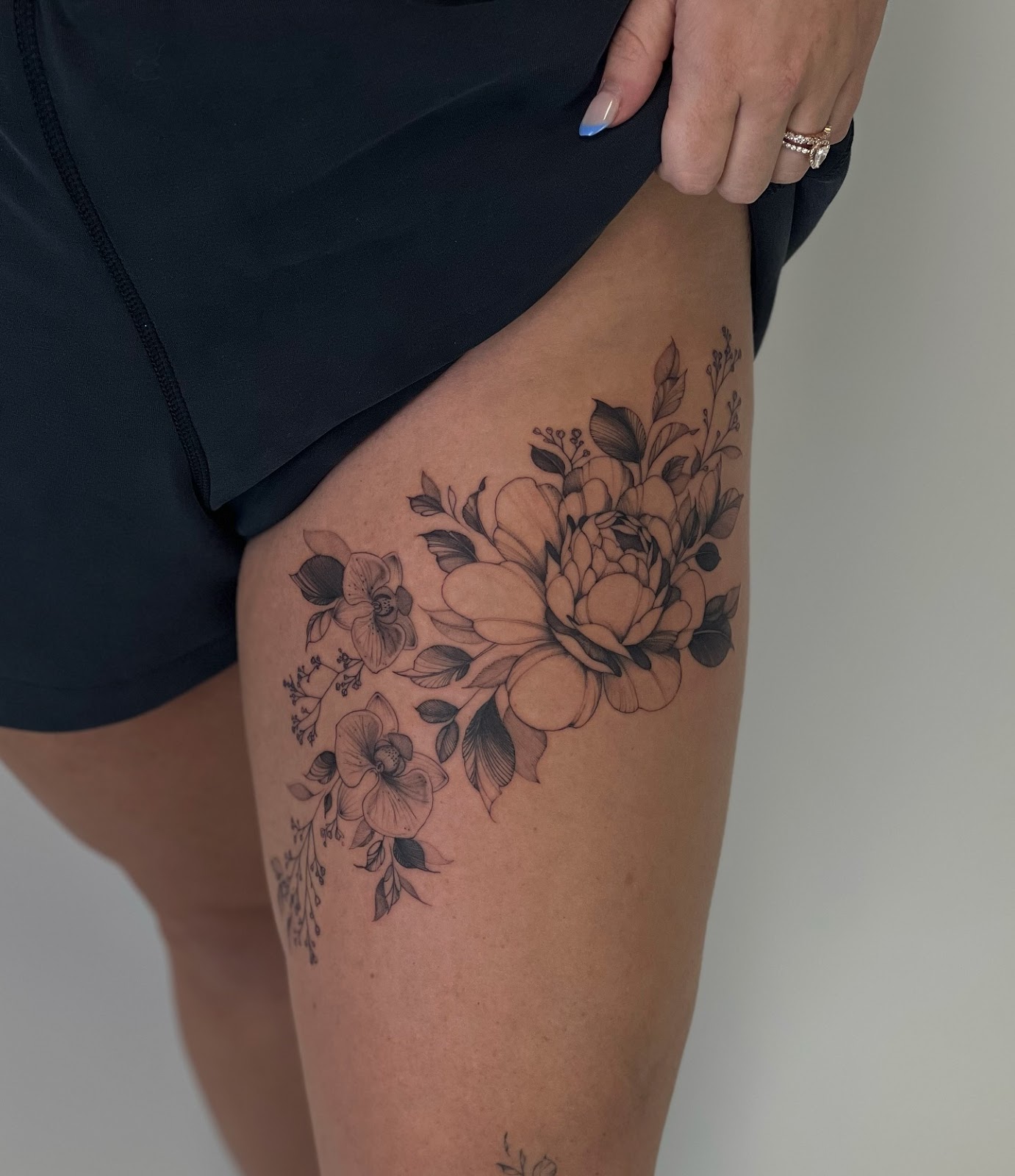 Lower Thigh Tattoo