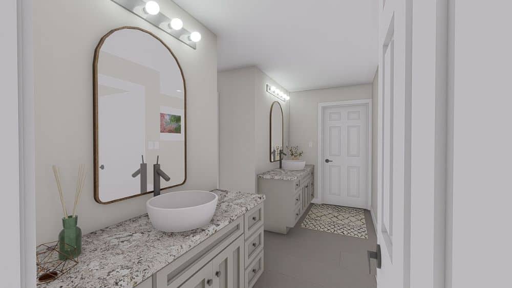 The primary bathroom features double vanities with vessel sinks and arched mirrors.
