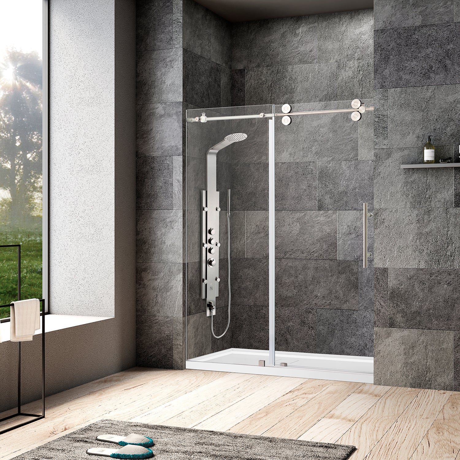 The bathroom is moderately modern, comprising a glass panelled shower screen with a nice sleek chrome sliding mechanism, a multi-valve shower panel; its walls are clad in textured gray stone tiles with light-wood plank flooring. One window, fronting to the left and with an outward view, covers it.