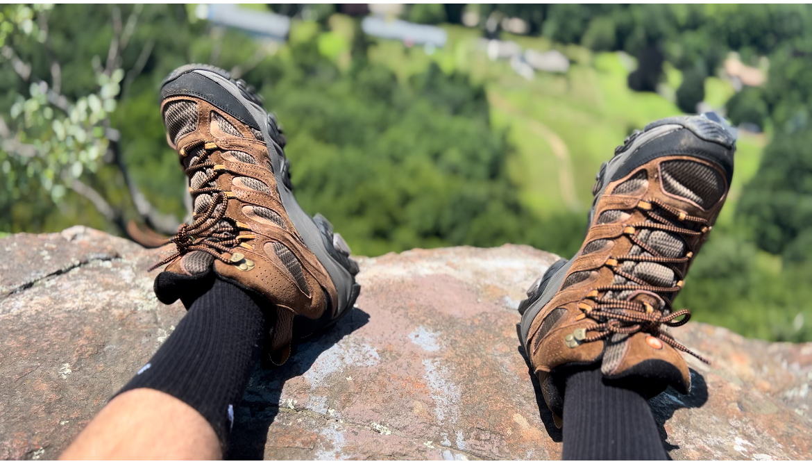 After testing, sitting on a rock showcasing the Moab 3's