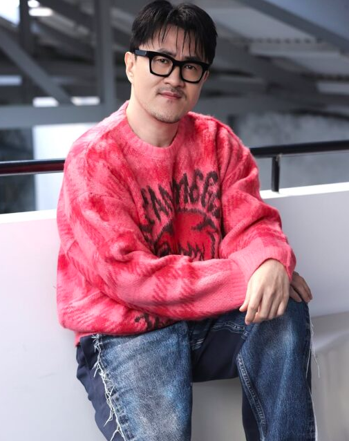 This contain an image of This contain an image of Korean rapper and TV personality Defconn weight loss transformation. 