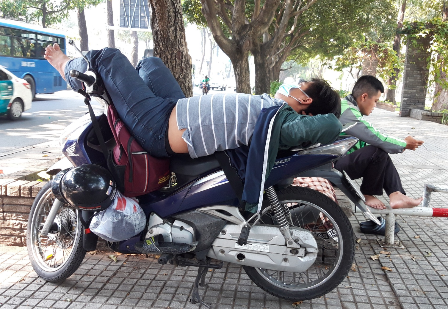 nap on motorbike in vietnam