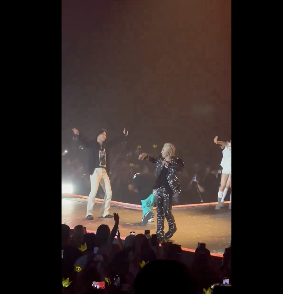  G-Dragon, Taeyang, and Daesung on stage performing