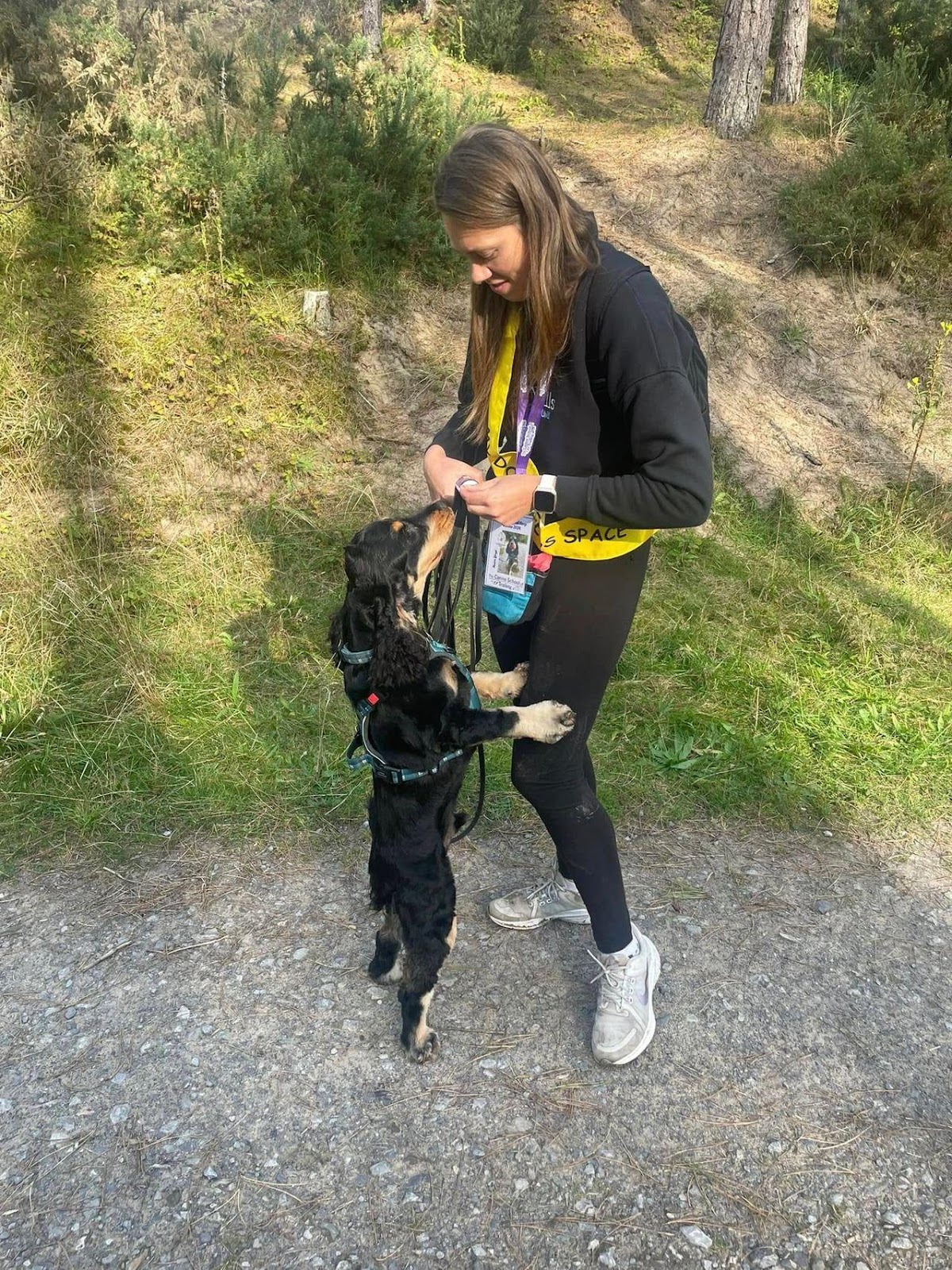 Hannah and Yogi on a trail wearing their "my dog needs space" sash to help people realise Yogi is nervous!