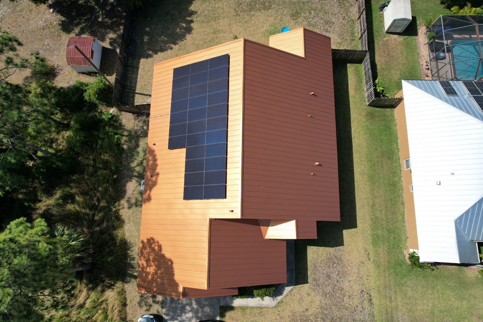 newly installed metal roof with solar panels