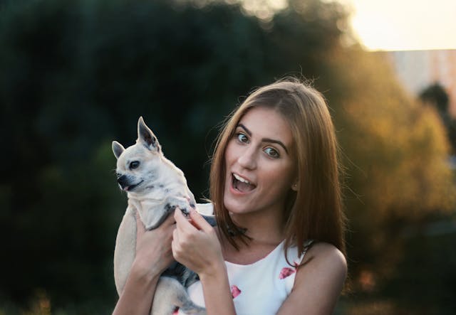 Tenant holding their pet dog