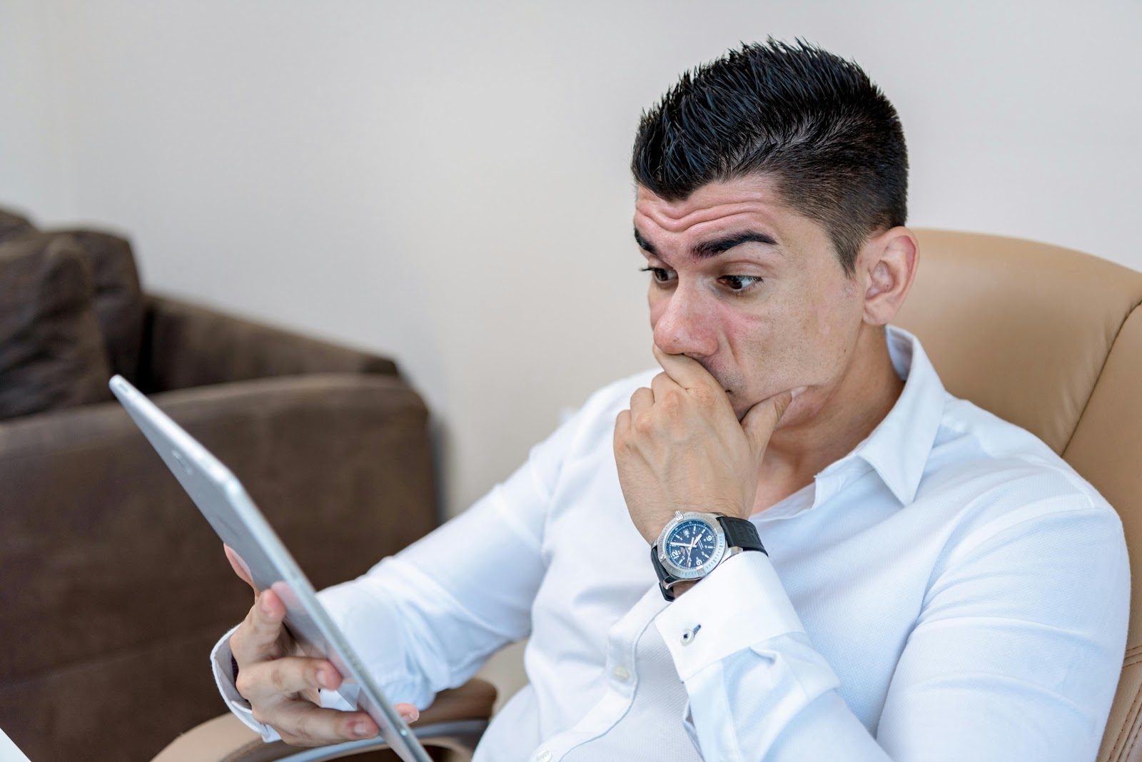 Person holding a tablet