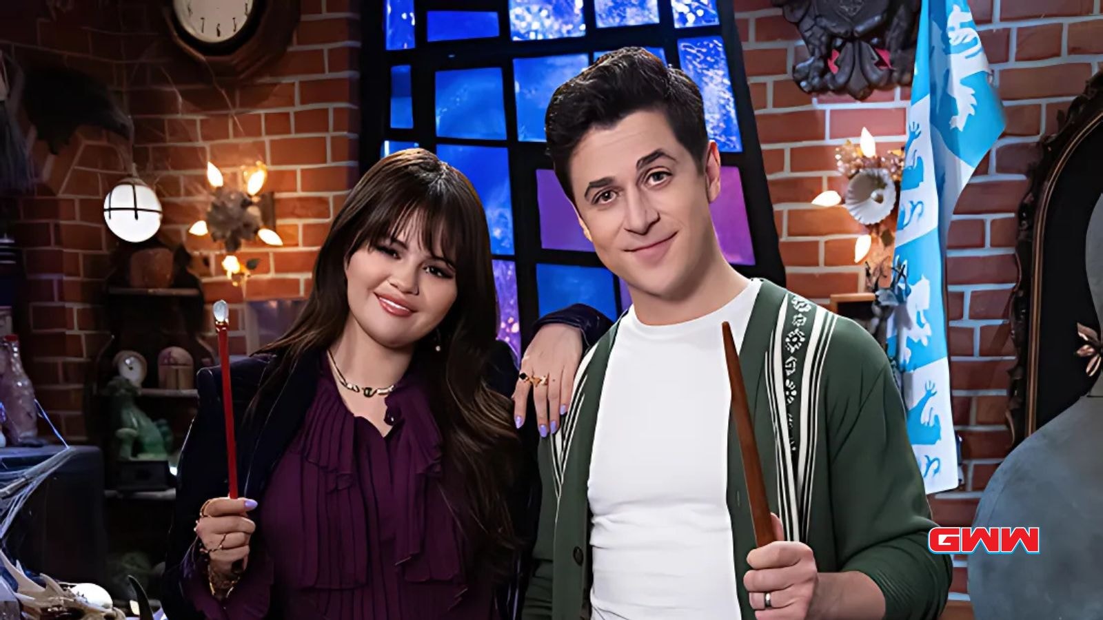 Selena Gomez and David Henrie holding wands together in Wizards Beyond Waverly Place