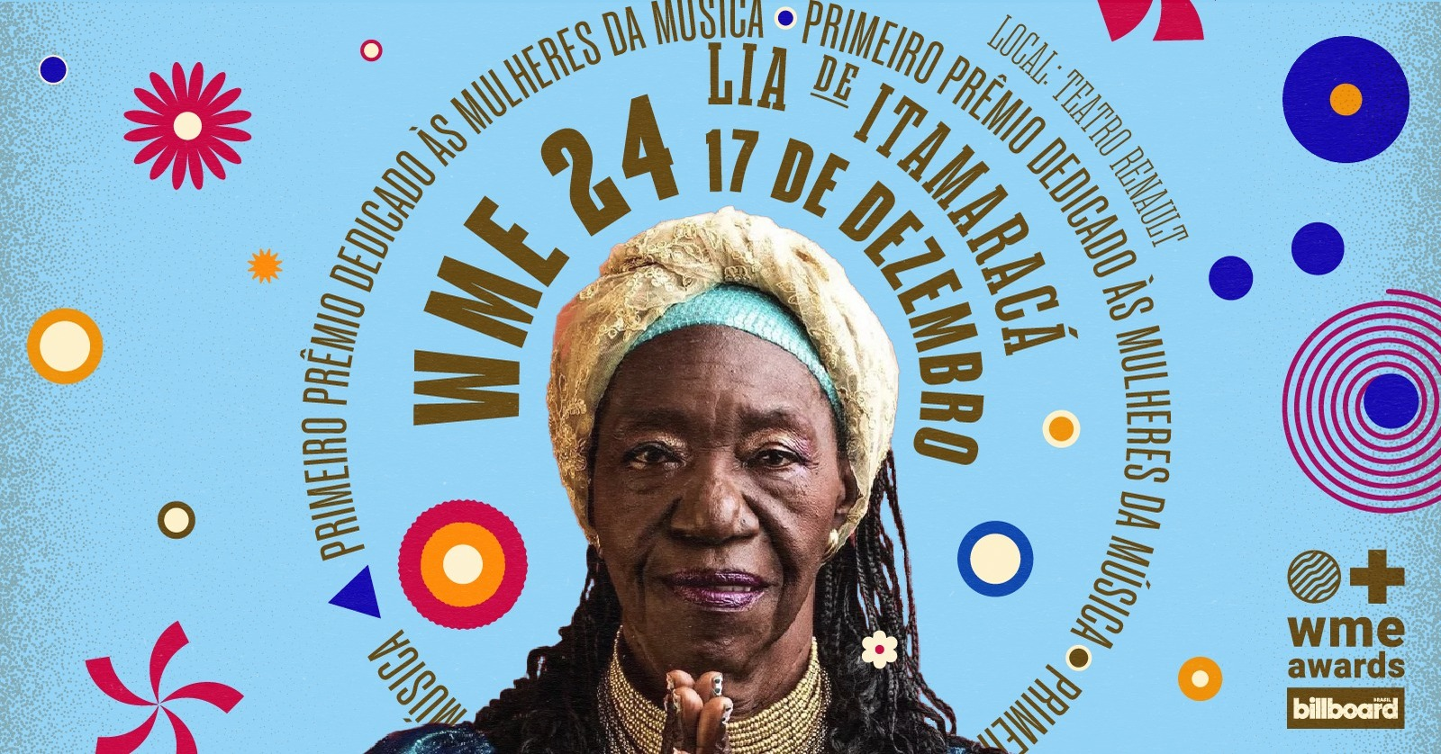 A imagem é o banner de divulgação do WME 24, que aconteceu no dia 17 de dezembro. O fundo é azul claro e no centro da imagem há uma mulher negra com as palmas unidas, em sinal de paz.