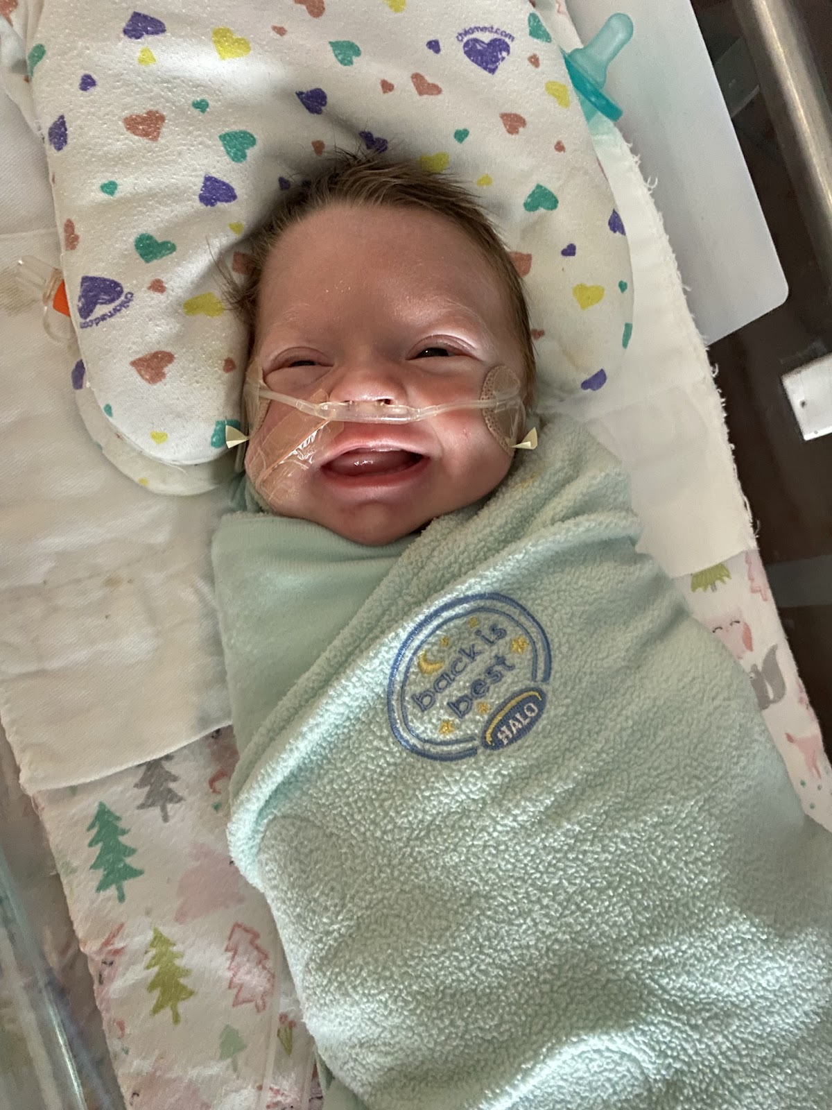 Smiling baby in the NICU.