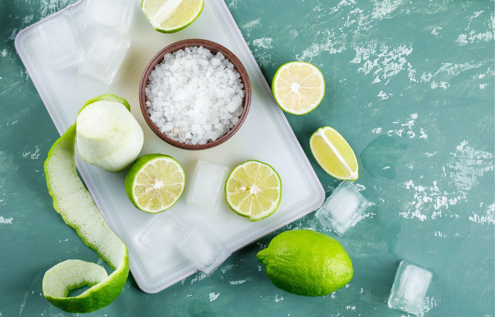 lemons-with-sa lt-ice-cubes-p laster-cutting -board.jpg