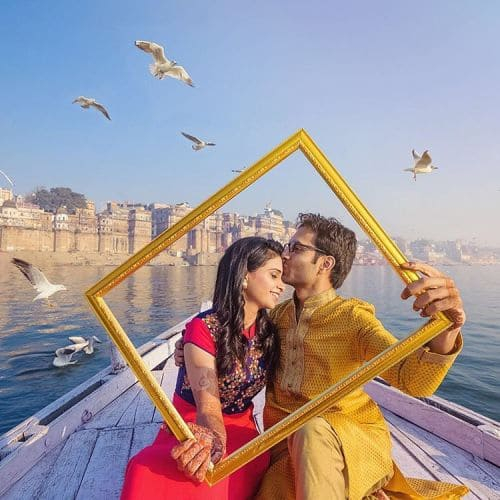 Pre-wedding photoshoot in Varanasi with a couple floating on a boat at Dashashwamedh Ghat