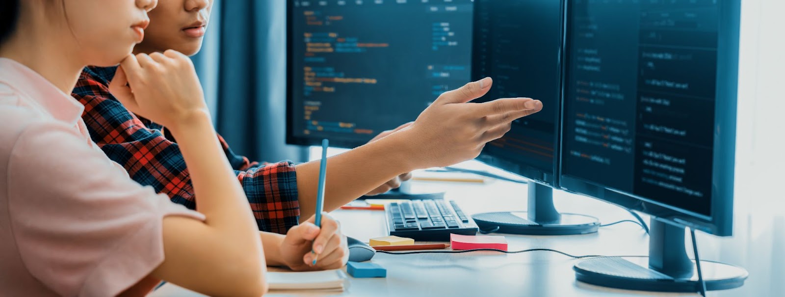 Developers implementing Gherkin scenarios in behavior-driven development workflow