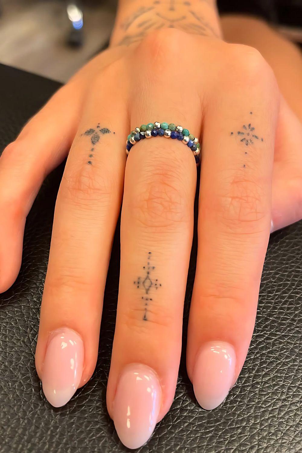 Healed Finger Tattoo