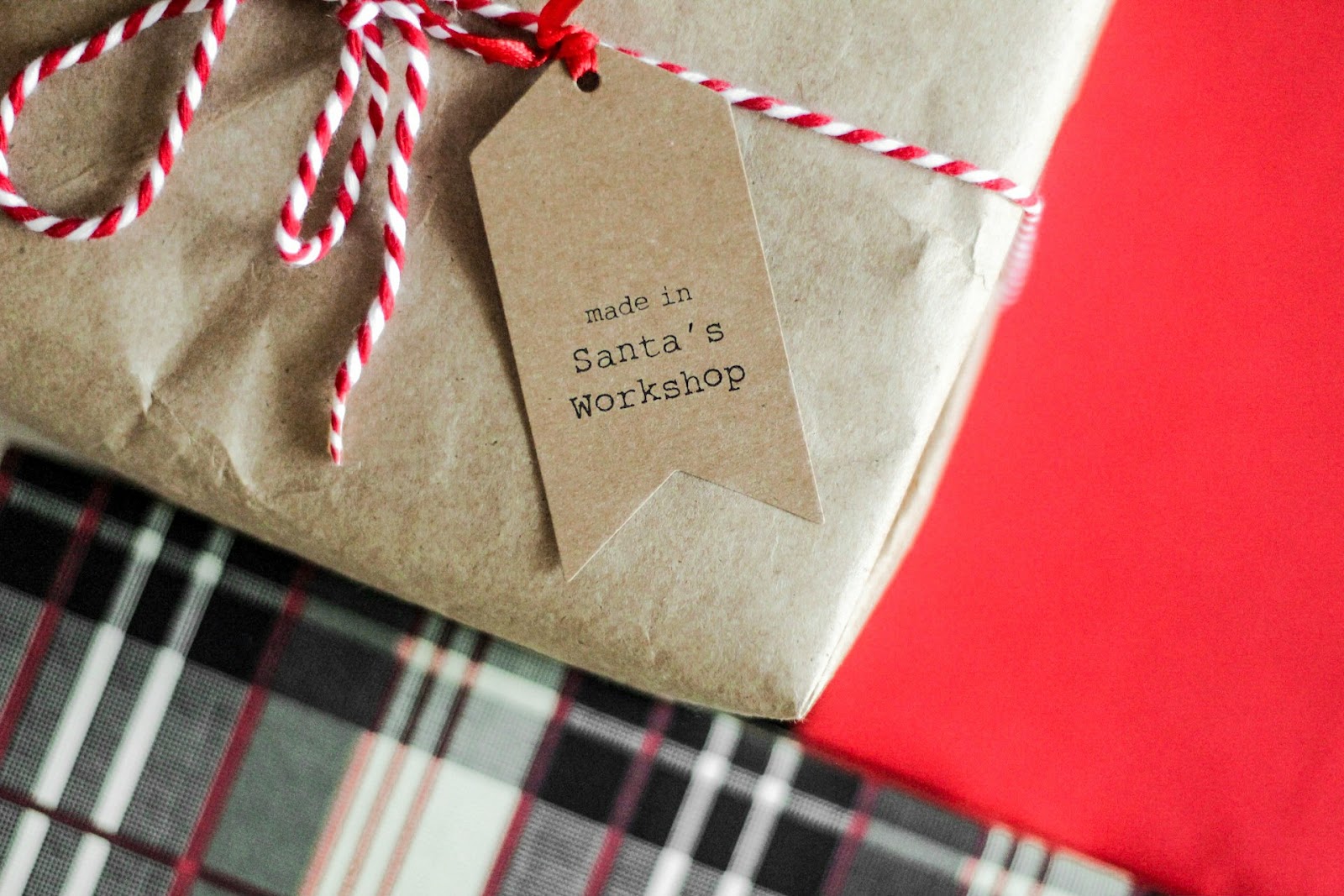 A gift with a tag that says 'made in Santa's Workshop'