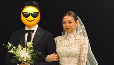 This contains an image of Min and her husband