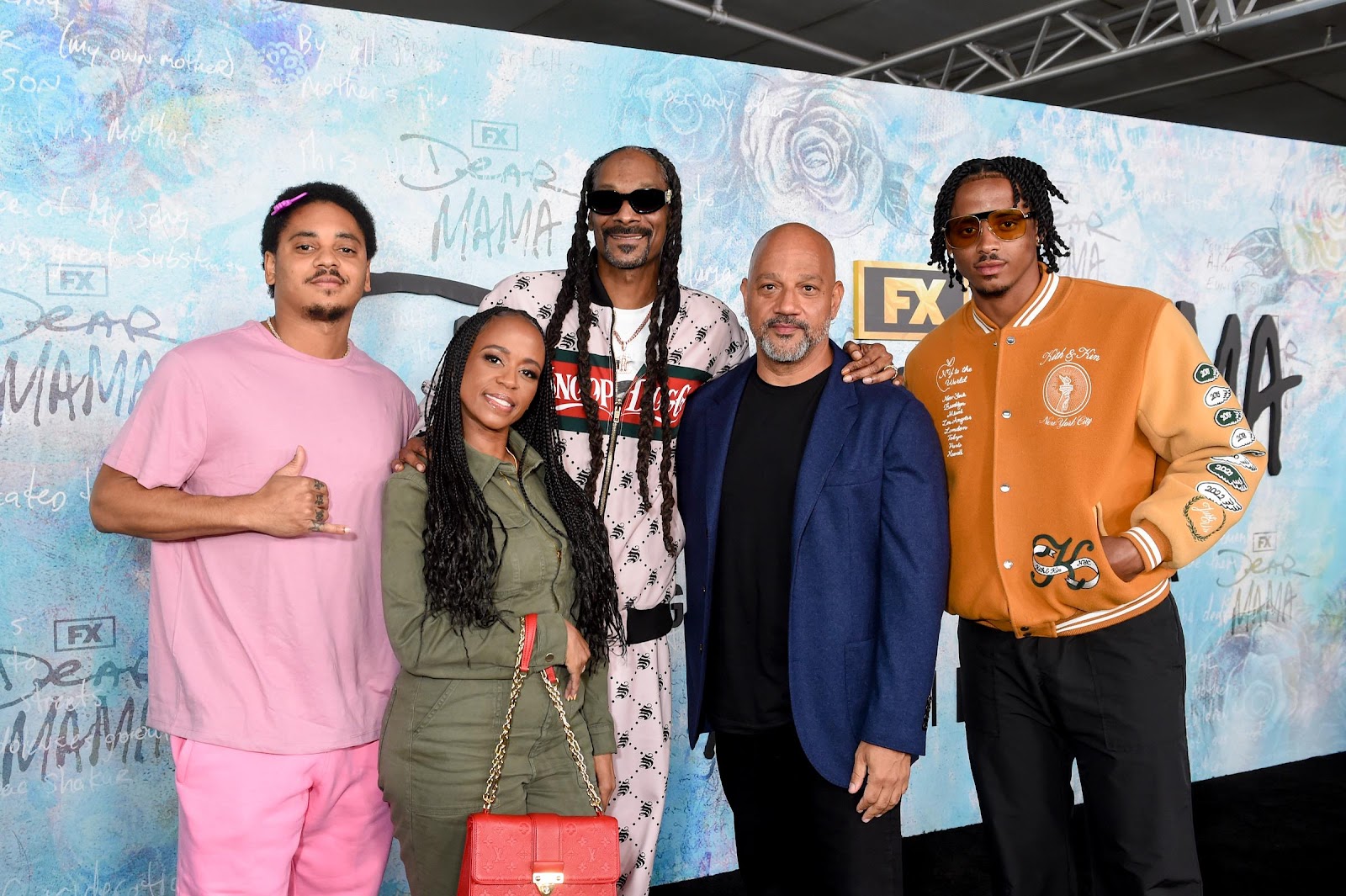 Snoop Dogg with his wife, two of his sons, and a friend at the premiere of "Dear Mama" held on April 18, 2023 | Source: Getty Images