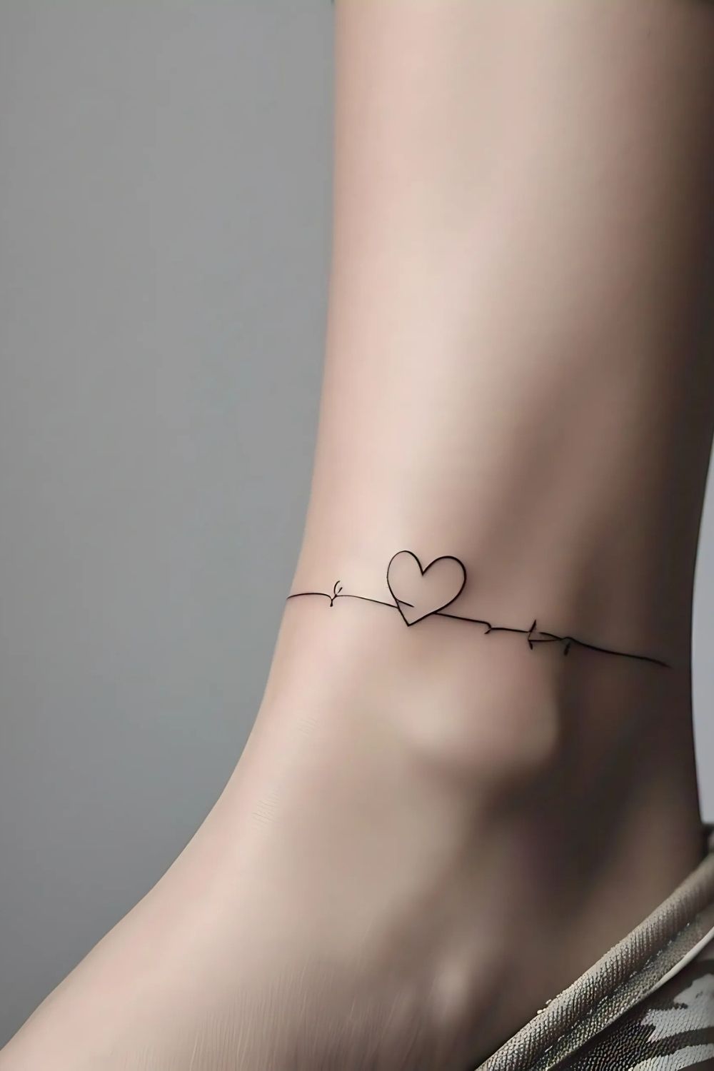 Fine Line Ankle Tattoo