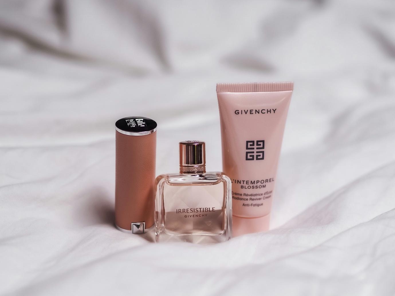A group of perfumes on a white surface  AI-generated content may be incorrect.
