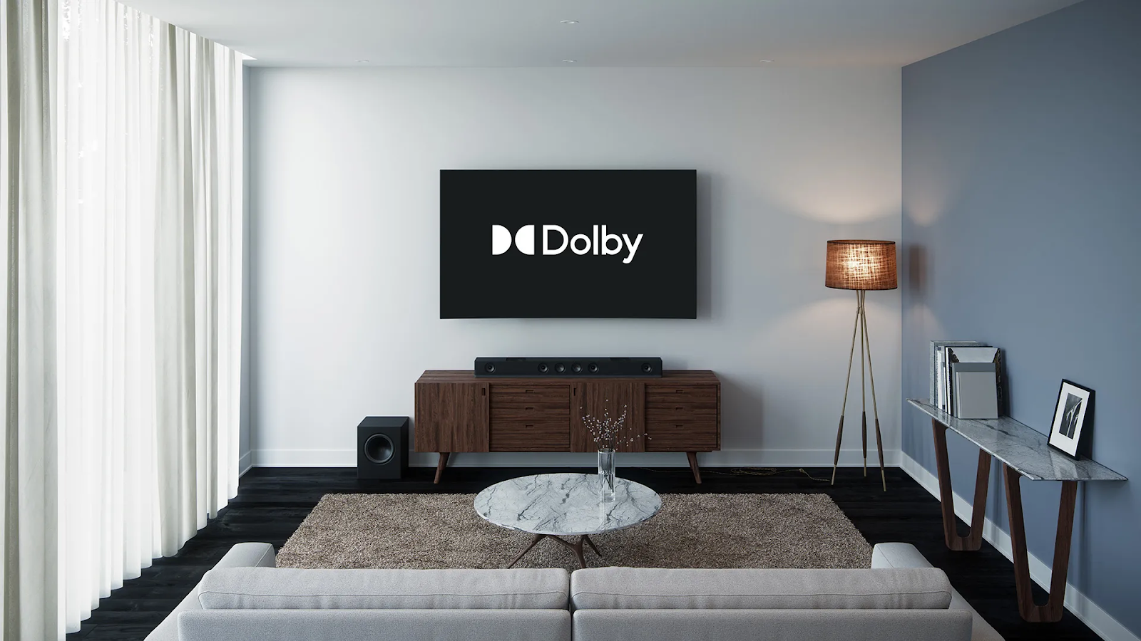 A cozy living room with TV showing Dolby logo on the screen.