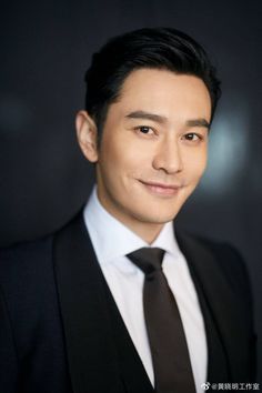 This contains an image of actor Huang Xiaoming