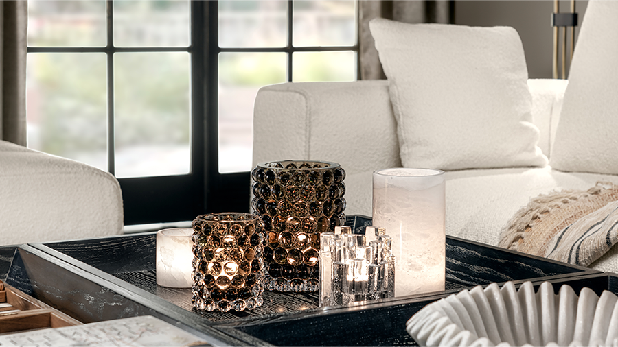 A table with candles on it

AI-generated content may be incorrect.