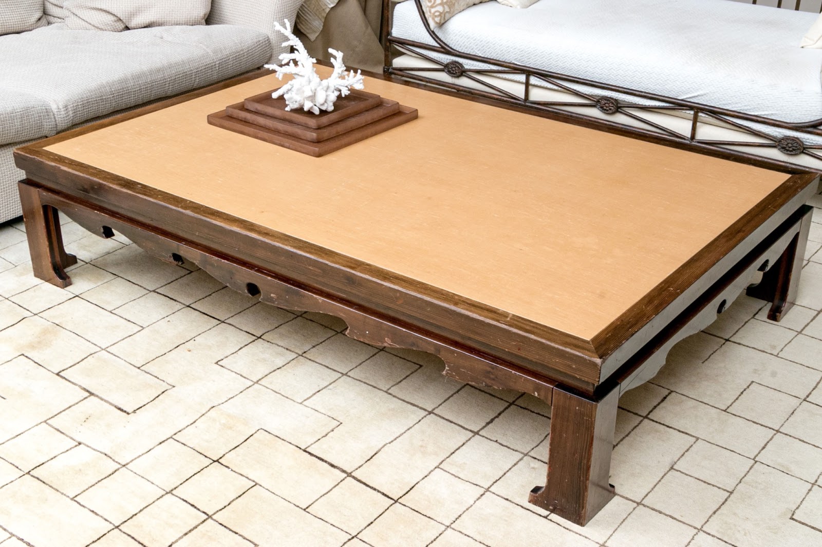 Chinese daybed with waxed linen top converted for use as an oversized coffee table